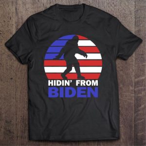 Hidin’ From Biden Anti Joe Biden 2024 Election Hiding Bigfoot American Flag Shirt 1 Hidin' From Biden Anti Joe Biden 2024 Election Hiding Bigfoot American Flag Shirt 2