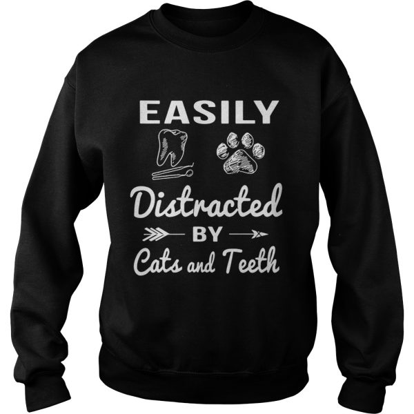 Easily distracted by cats and teeth shirt
